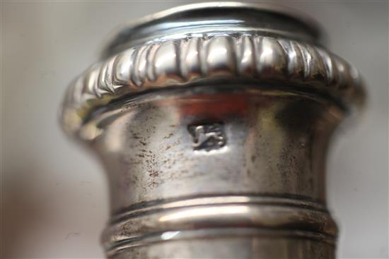A pair of late George II cast silver candlesticks by Thomas Whipham and Charles Wright, 45 oz.